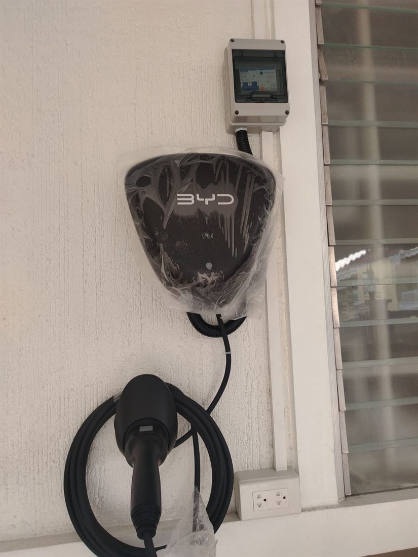 Completed BYD wall charger installation on a residential wall